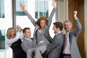 Businesspeople celebrating success